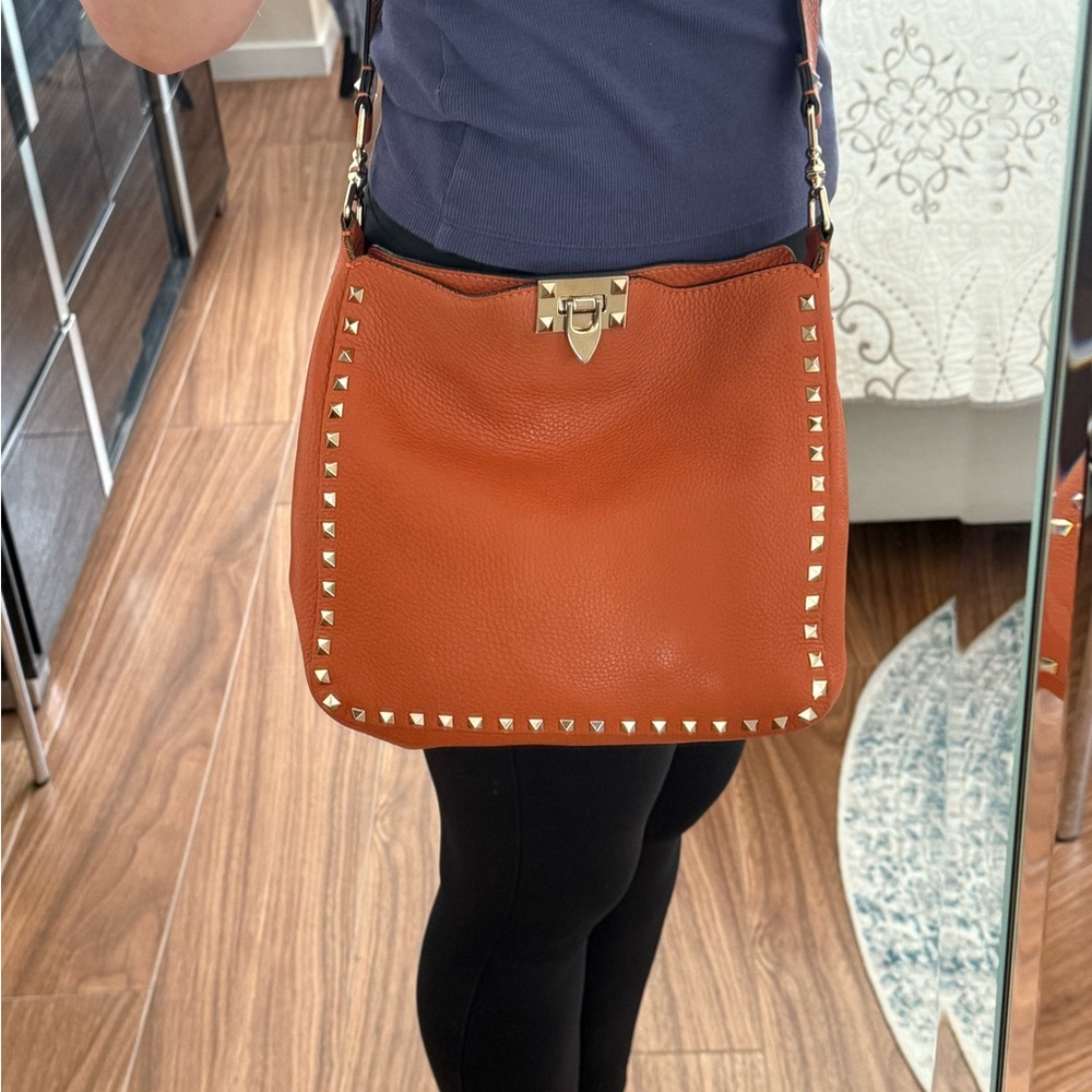 Valentino Garavani Orange Studded Crossbody Bag